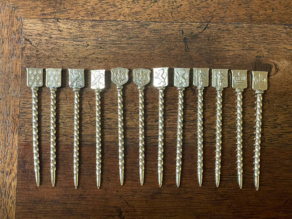 Set of 12 Vintage Gold-Dipped Heraldic Cocktail Picks, c. 1950's-60's