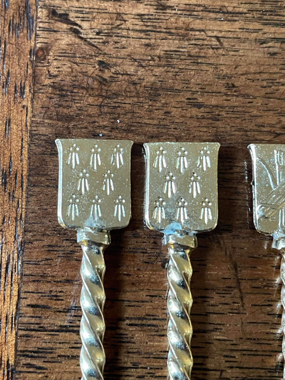 Set of 12 Vintage Gold-Dipped Heraldic Cocktail Picks, c. 1950's-60's