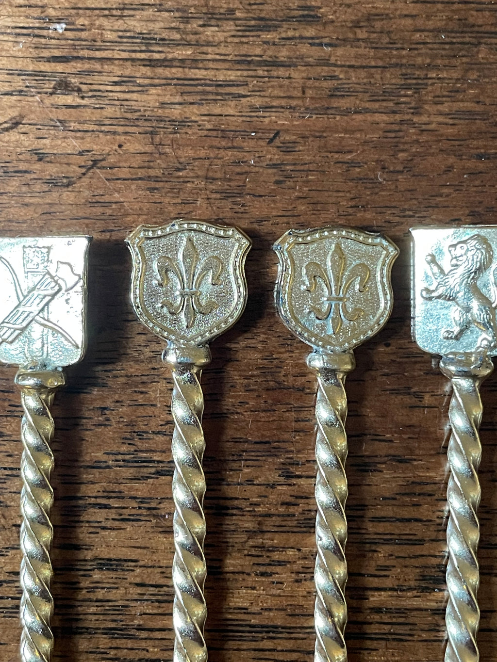 Set of 12 Vintage Gold-Dipped Heraldic Cocktail Picks, c. 1950's-60's
