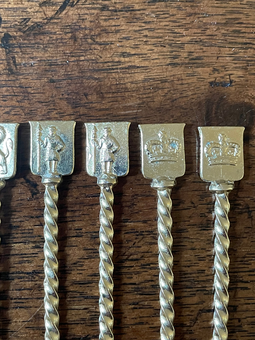 Set of 12 Vintage Gold-Dipped Heraldic Cocktail Picks, c. 1950's-60's