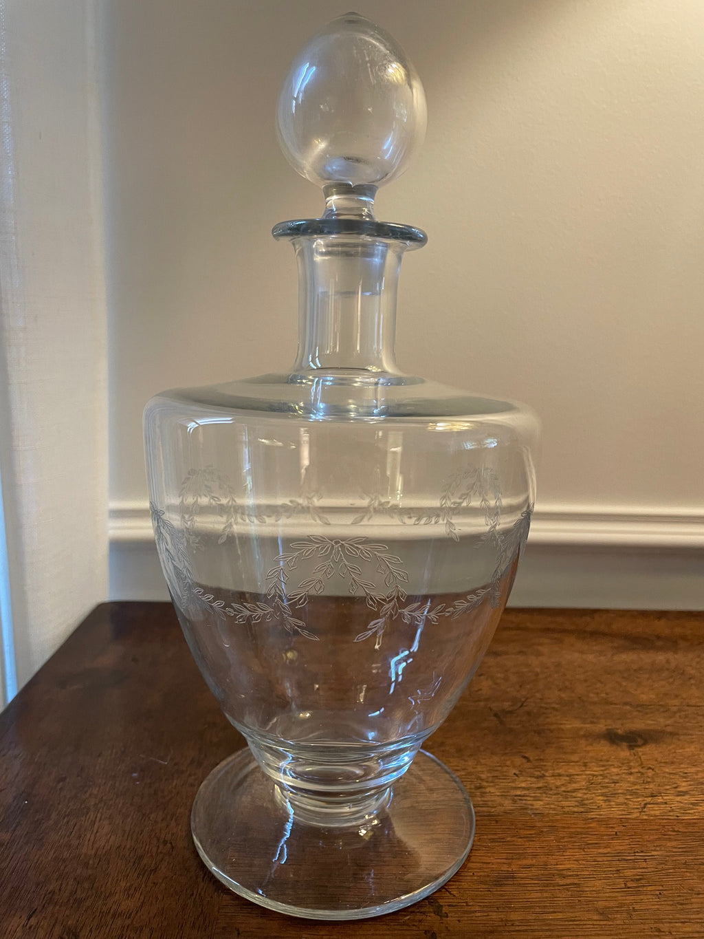 Vintage Hand-blown Glass Footed Blown Glass Eteched Laurel Wreath Motif Decanter with Lid (approx 12 inches tall, 5.5 inches wide)